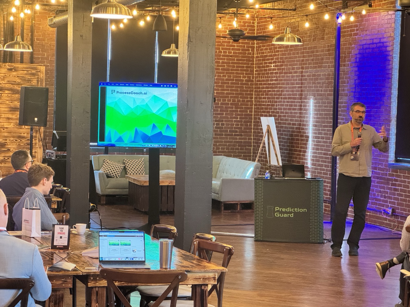 Jason Beutler presenting ProcessCoach.ai at a Midwest AI summit