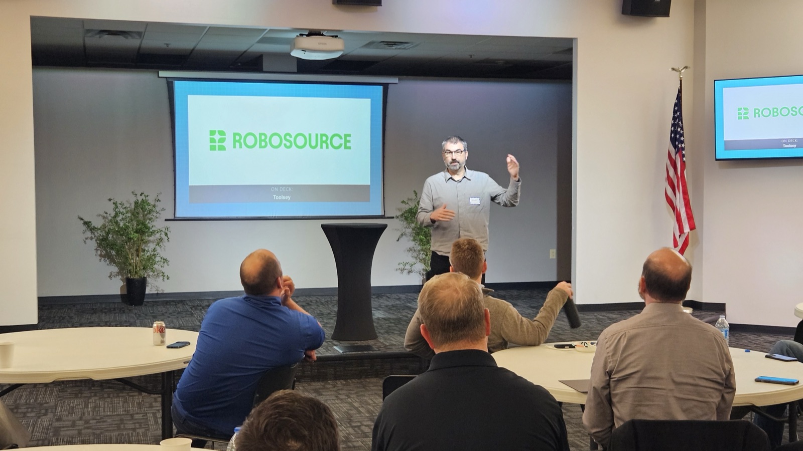 Jason Beutler presenting at a Robosource roundtable event